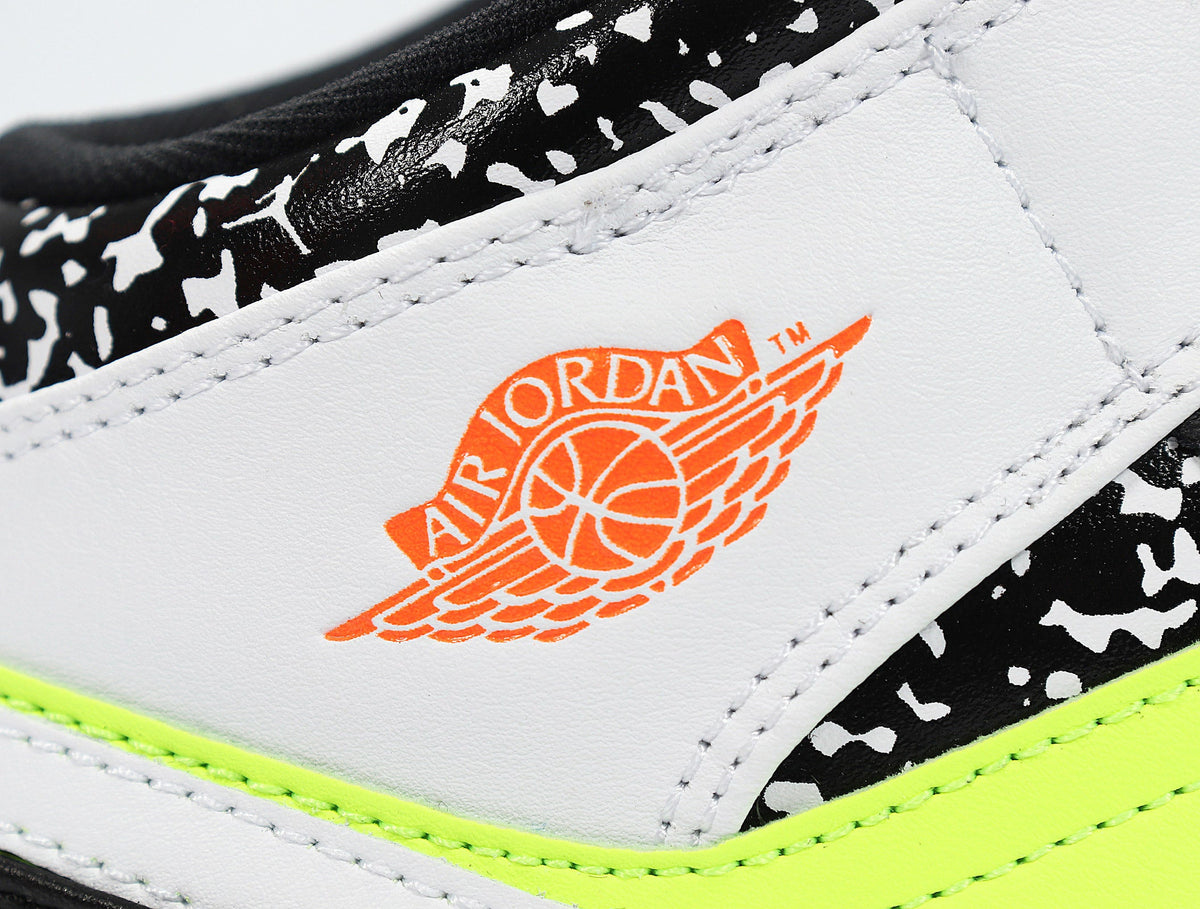 Jordan 1 Low Sneakers in Yellow Orange 554725-870 - product image from the listing.