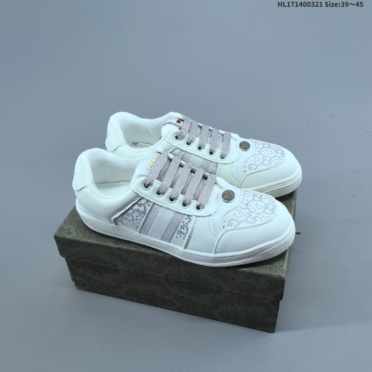 Gucci Screener Distressed Low-Cut Sneakers - product image from the listing.