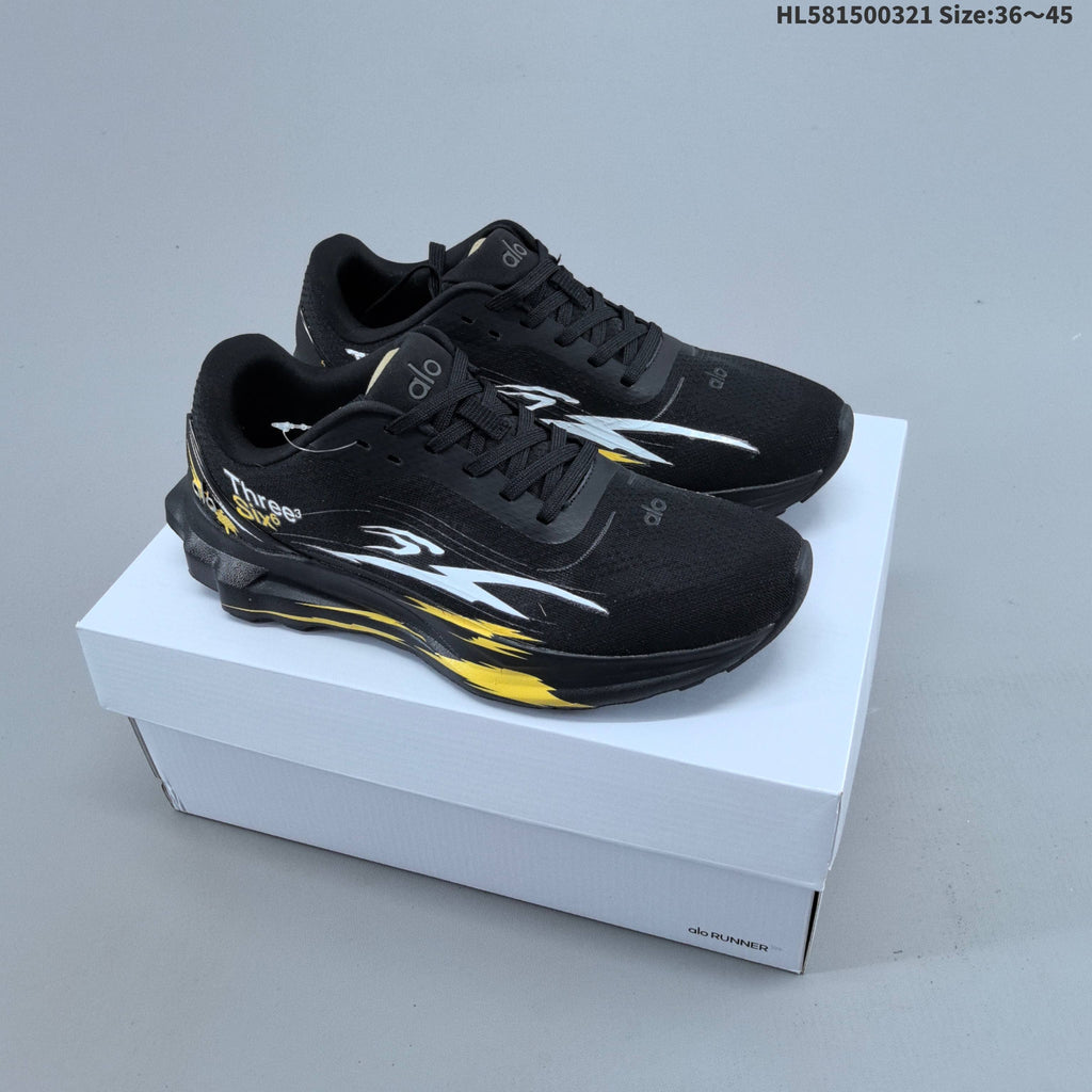 Alo Yoga Alo Runner Graphic Running Sneakers, in Black - product image from the listing.