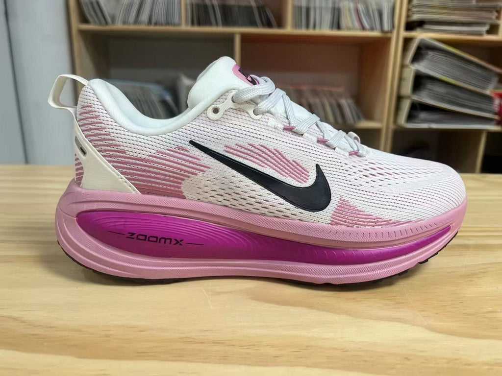 Nike Vomero 18 Running Shoes in White Pink - product image from the listing.