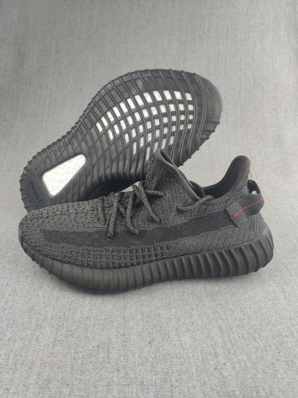 Yeezy Boost 350 V2 Sneakers in Dark Gray Knit - product image from the listing.