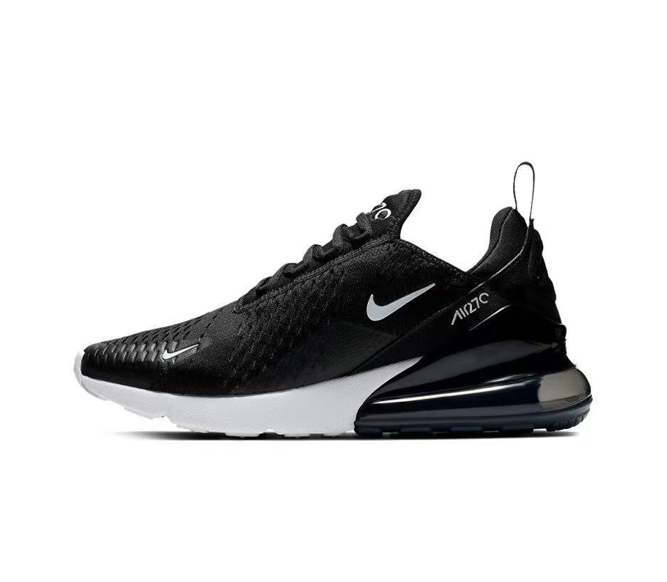 Nike Air Zoom Sneaker in Black and White - product image from the listing.