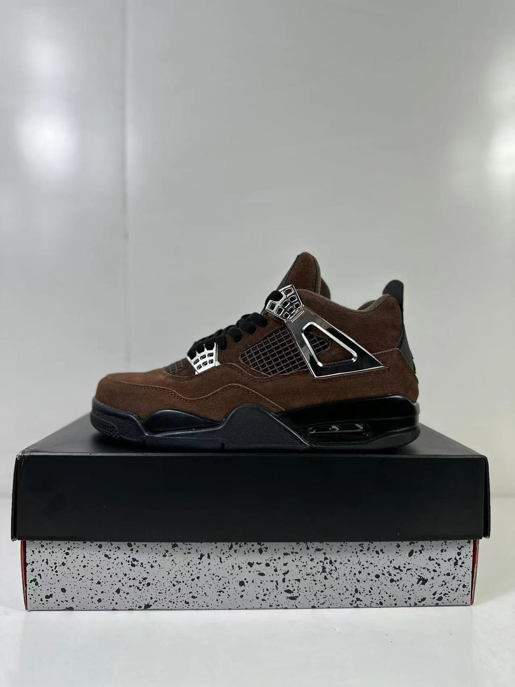 Air Jordan 4 Retro Brown Black AQ9129-002 - product image from the listing.