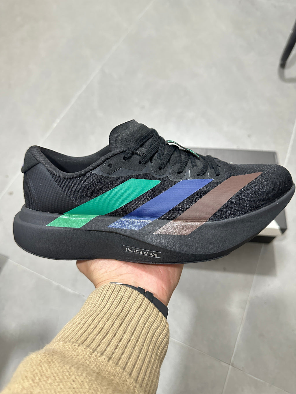 adidas Lightstrike Pro Running Shoes in Black Multicolor - product image from the listing.