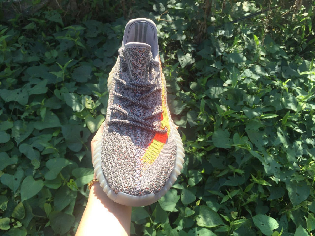 Yeezy 350 V2 Sneakers in Gray and Orange Knit - product image from the listing.