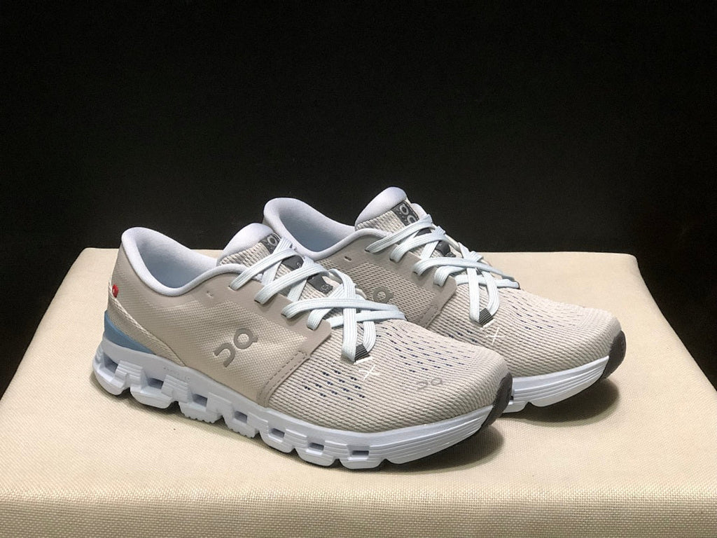 Silver and Blue On Cloud X 4 Sneakers - product image from the listing.