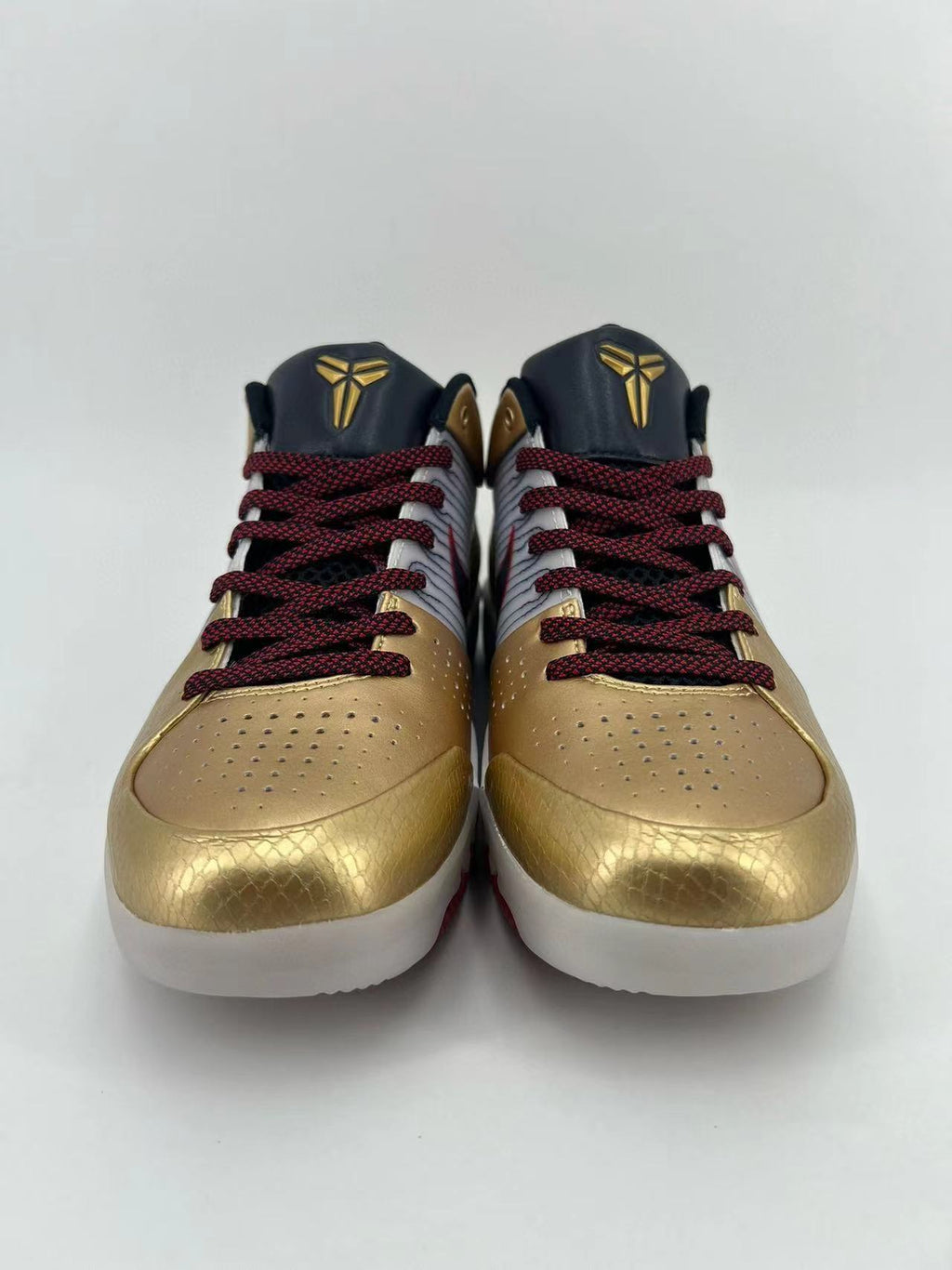 Nike Kobe 4 Protro Sneakers in Gold White 344335-141 - product image from the listing.