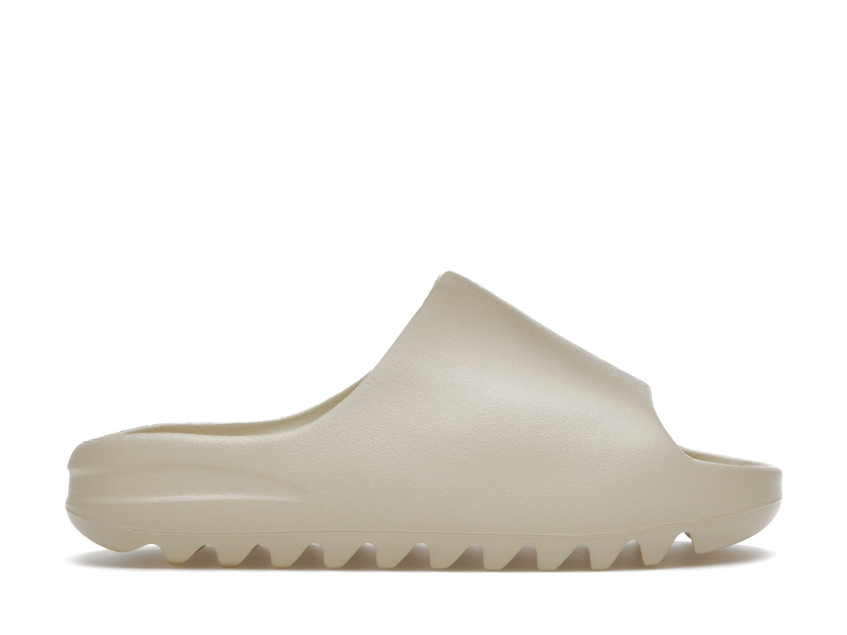Yeezy Slide - Bone - product photo shown in the listing for this item.