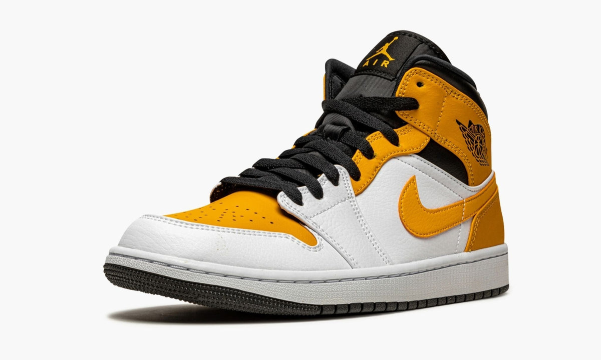 Jordan 1 Mid in University Gold - product image from the listing.