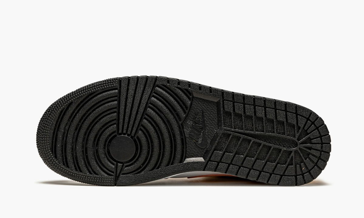 Jordan 1 Mid in University Gold - product image from the listing.