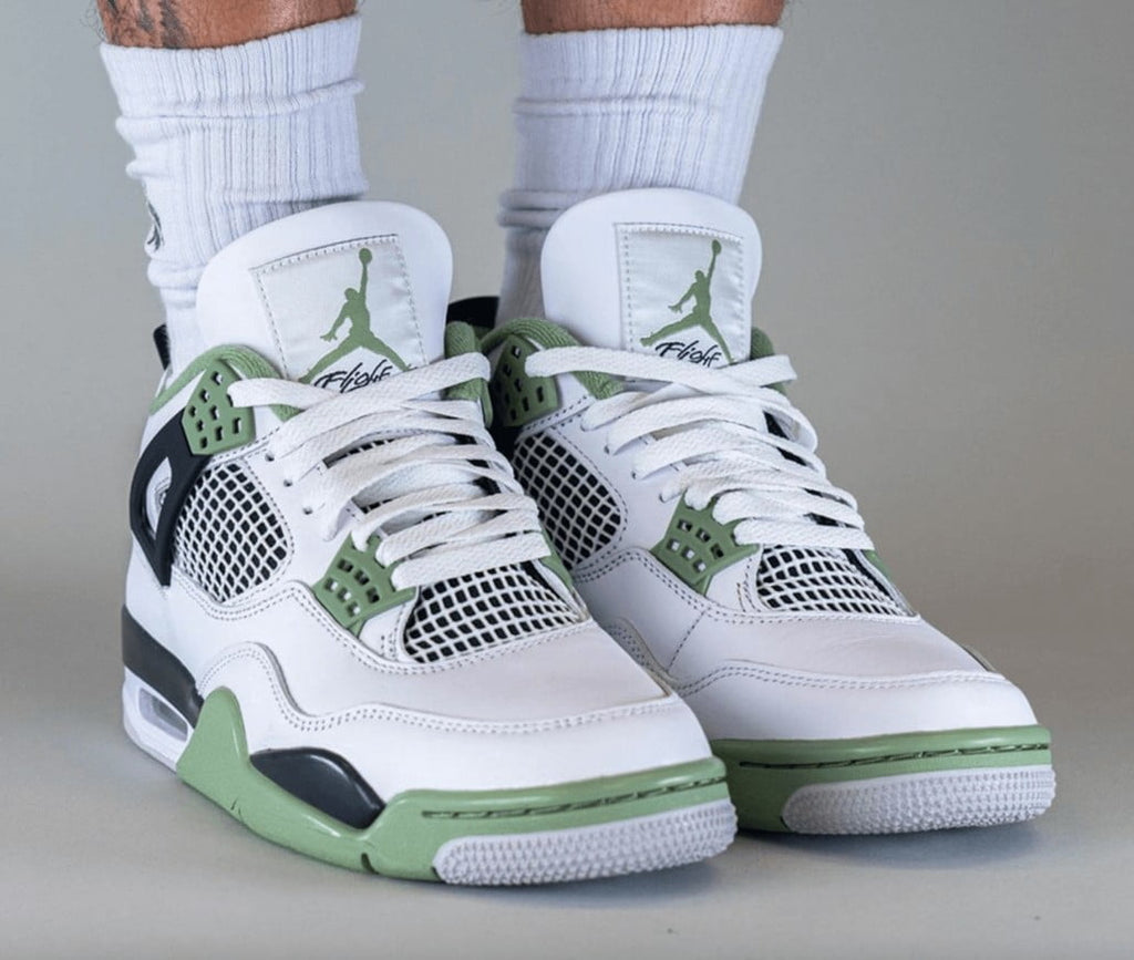 Women's Jordan 4 Retro Seafoam - product image from the listing.