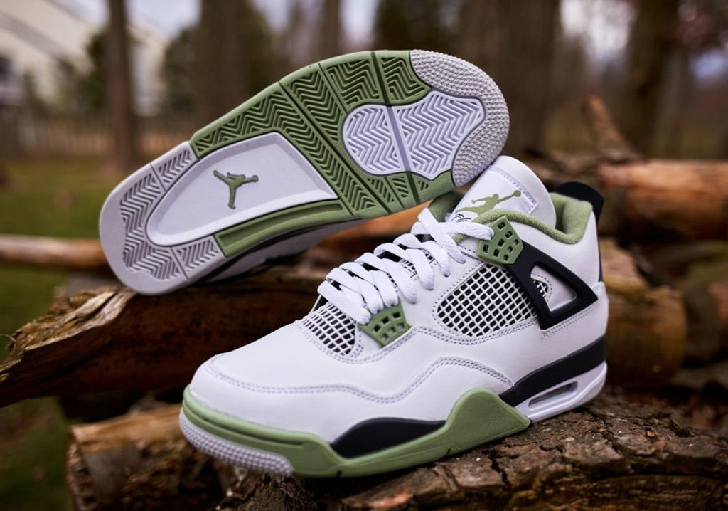 Women's Jordan 4 Retro Seafoam - product image from the listing.