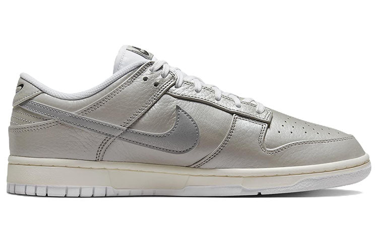 Nike Dunk Low in Metallic Silver - product image from the listing.