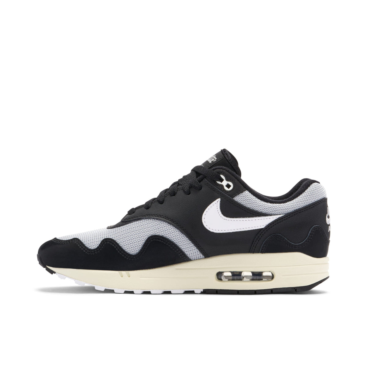 With Bracelet - Patta x Nike Air Max 1 Black White - product image from the listing.