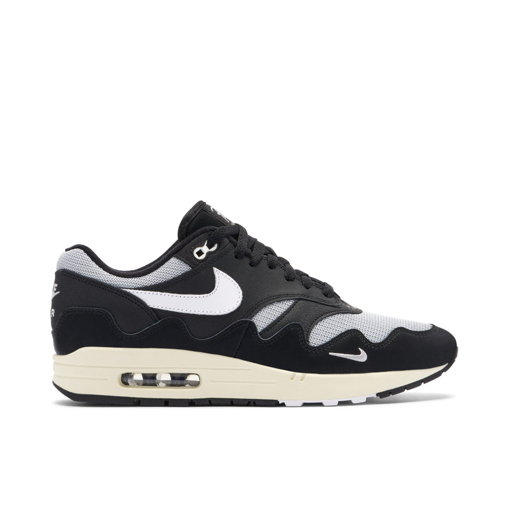 With Bracelet - Patta x Nike Air Max 1 Black White - product image from the listing.