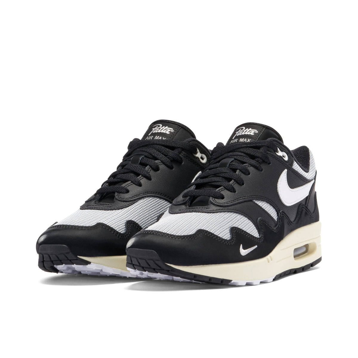 With Bracelet - Patta x Nike Air Max 1 Black White - product image from the listing.